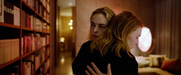 Lydia and her wife (Nina Hoss) hugging in a large apartment