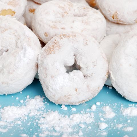 small icing sugar covered donuts