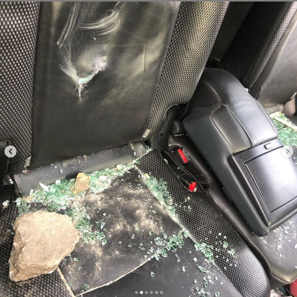 Xenophobia: Lady shares photos of injuries she sustained and damages done to her car after being attacked in Lagos protest