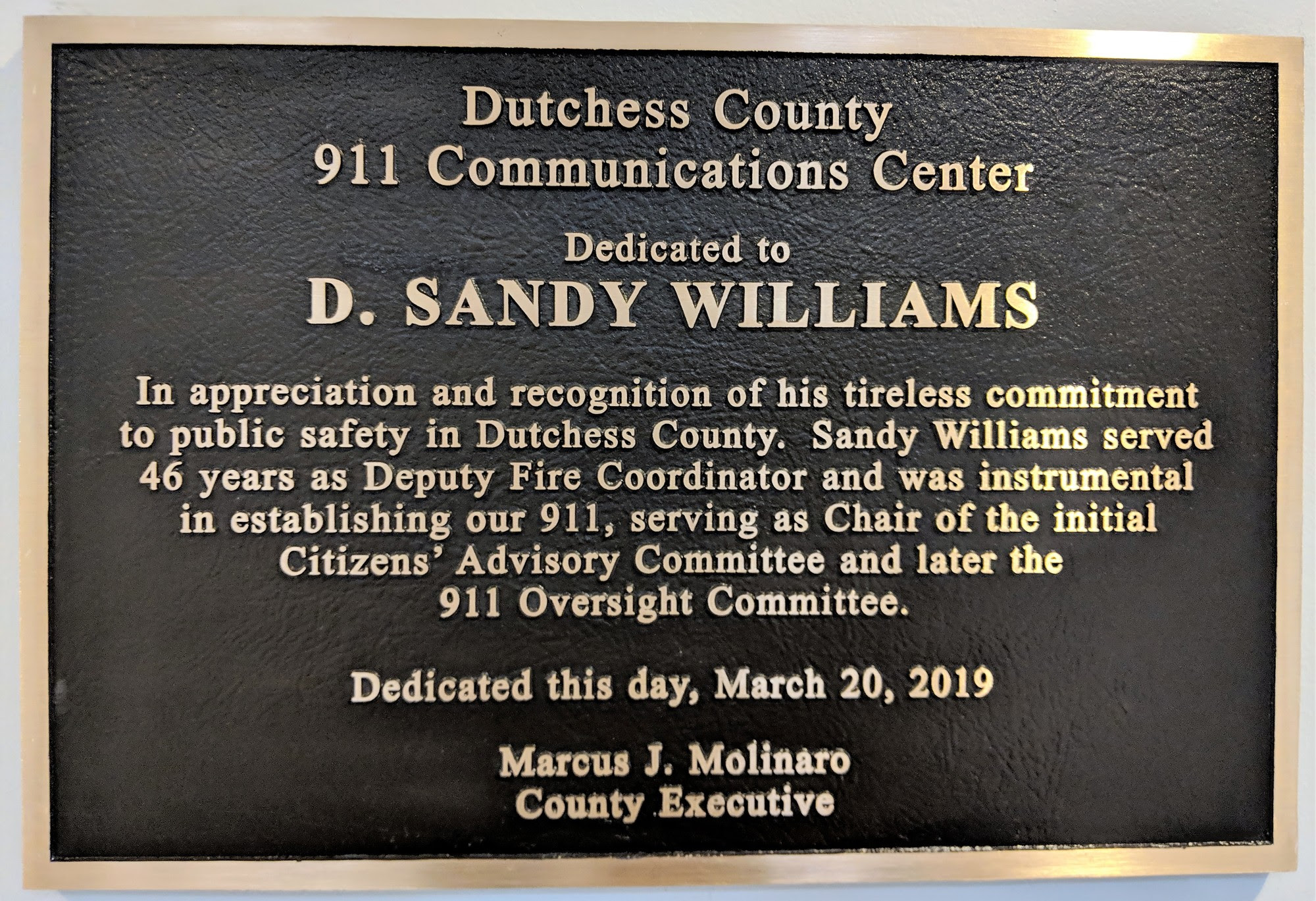 In recognition of Mr. Williams’ decades of service and his leadership, a plaque now adorns the Dutchess County 9-1-1 Communications Center.