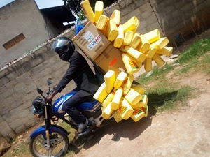 Alex Taking supplies to Muira and Kamira Alex Taking supplies to Muira and Kamira