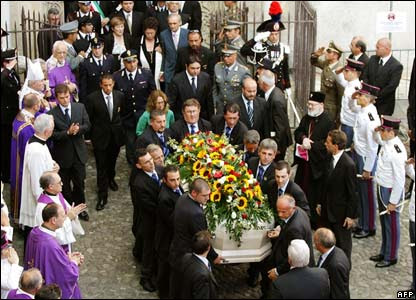 Coffin being taken out of the cathedral