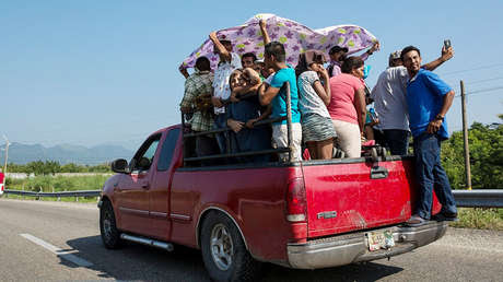 Migrantes de Honduras en Arriaga, México.