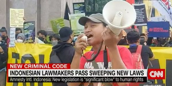 CNN footage of a protest against Indonesia's new laws.