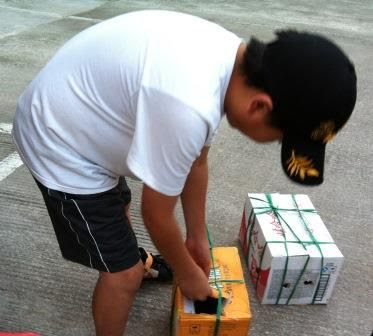 Eric, son of Shanli Zhao, especially was interested in the chickens. We ate them the next day for lunch.