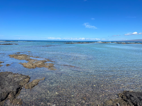 Enjoying a relaxing day at the beach in front of the Mauna Lani resort on Hawaiʻi Island.
