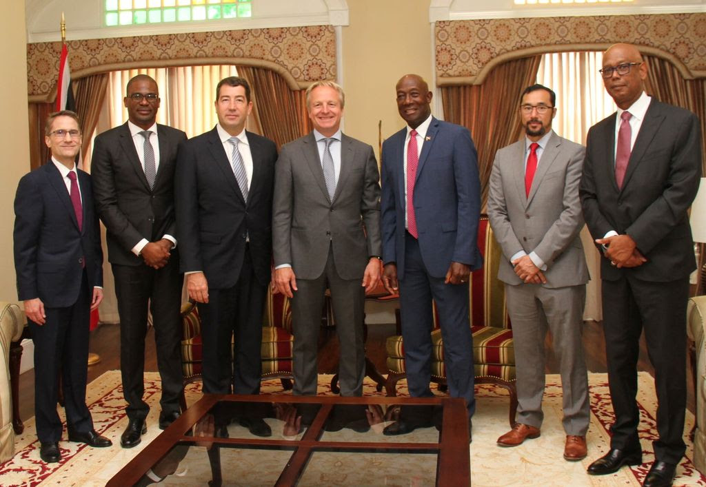 Prime Minister Dr Keith Rowley (3rd from right) and Minister in the Office of the Prime Minister Stuart Young (2nd from right) with Shell officials at Whitehall on Monday.