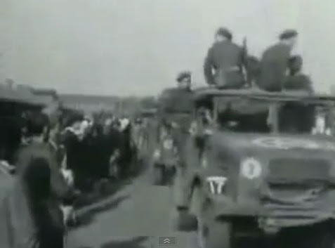 &amp;quot;American&amp;quot; lorries with a                             five pointed star on the hood coming with                             German prisoners of war (1min. 49sec.)