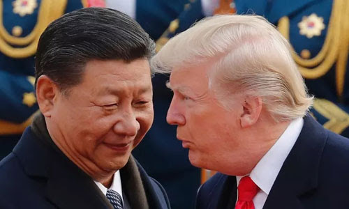 Chủ tịch Tập Cận Bình (trái) đón Tổng thống Mỹ Donald Trump thăm Trung Quốc năm 2017. Ảnh: Reuters.
