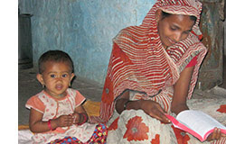 Woman receiving Bible