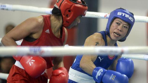  Mary Kom (blue) wil lead the women’s team. File 