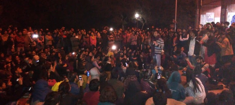 As police wait at the gate, JNU students accused of sedition say they won't refuse arrest