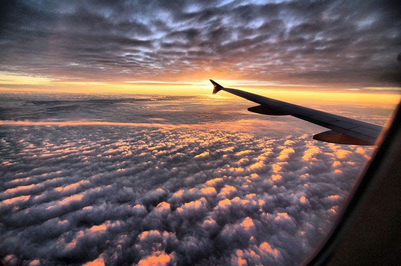 sunset above the clouds from an airplane