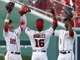 Washington Nationals left fielder Juan Soto (22), center fielder Victor Robles (16) and center fielder Michael A. Taylor (3) celebrate their win over the Miami Marlins, Sunday, May 26, 2019, in Washington. (AP Photo/Jacquelyn Martin) ** FILE **