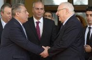 Israeli President Reuven Rivlin (R) shakes hands with incoming Egyptian Ambassador to Israel Hazem Ahdy Khairat during a ceremony for new ambassadors at the Presidential Residence in Jerusalem, February 25, 2016.
