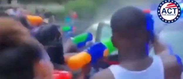 new-video-shows-cops-being-water-bombed-in-atlanta