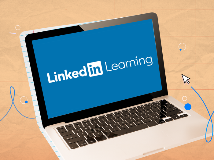 LinkedIn Learning Logo on a laptop screen with orange background