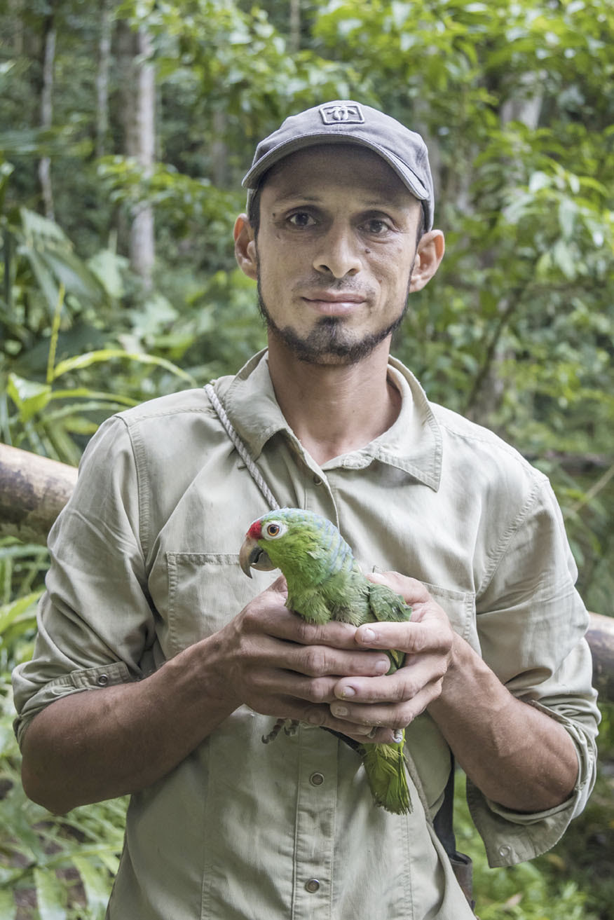 David holding Red Lored Parrot