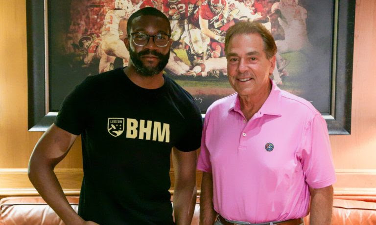 Birmingham Mayor Randall Woodfin poses with Nick Saban