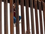 Children from Anapra, Mexico, climb a section of the new border wall recently built near Santa Teresa, N.M., Monday, April 9, 2018. The head of the U.S. Border Patrol sector that includes part of West Texas and all of New Mexico said Monday he met with leaders of the New Mexico National Guard to begin discussions about what will be required and their capabilities. (Ruben R. Ramirez/The El Paso Times via AP)