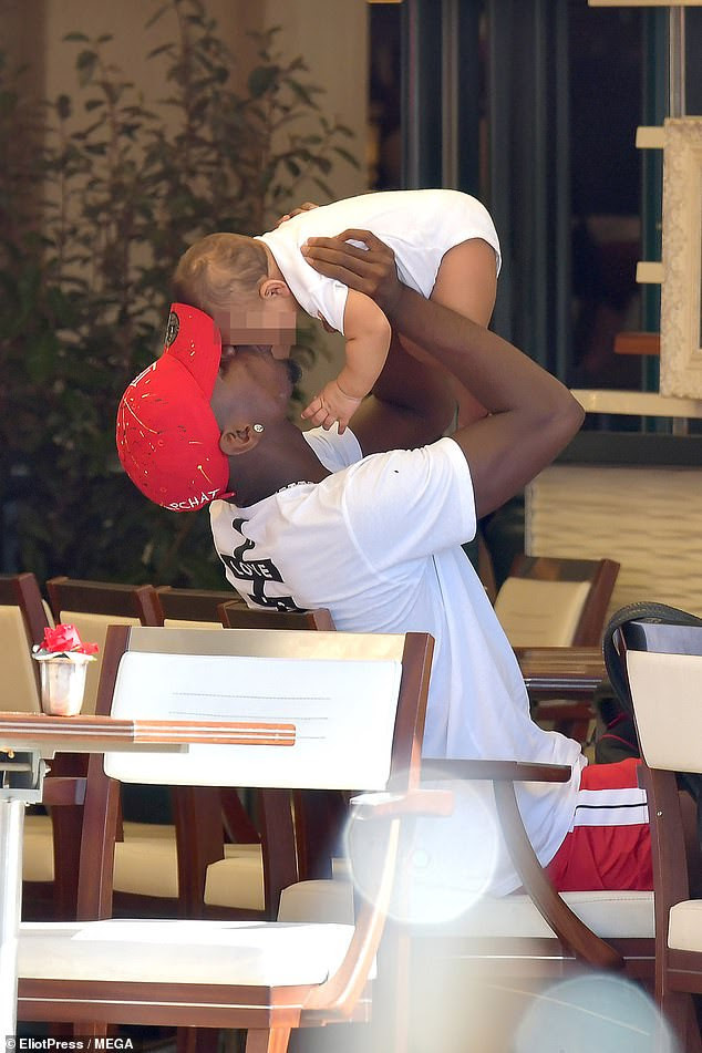 Man.U star Paul Pogba and girlfriend Maria Salaues take their son for a sunny stroll in Saint Tropez (Photos)