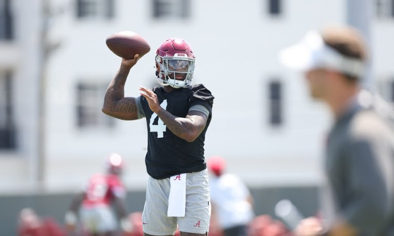 Alabama QB Jalen Milroe (#4) attempts a pass in 2022 Fall Camp Practice
