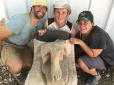 The three volunteer excavators who found the statue, from left to right: Valentin Sama-Rojo from Spain, Bryan Kovach from the United States, and Elanji Swart from South Africa. / Photo credit: Shlomit Bechar