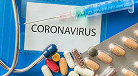 photo of pills, syringe, and the word "Coronavirus"