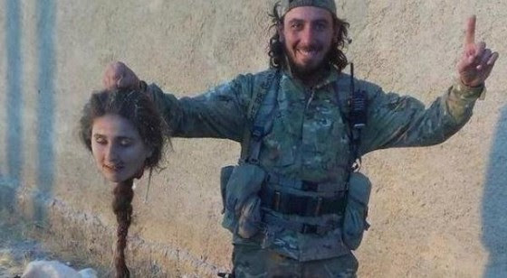 A Syrian Kurd                                                       woman, member of                                                       The People’s                                                       Protection Units                                                       (Yekîneyên                                                       Parastina Gel –                                                       YPG) who was                                                       fighting for her                                                       family has been                                                       beheaded by                                                       takfiri terrorist                                                       of ISIS in Kobane.                                                       Shia Post                                                       According to                                                       reports, takfiri                                                       killer who shared                                                       his photo with                                                       head of a YPG’s                                                       fighter has been                                                       sent to hell by                                                       YPG.