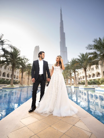 A person and person in wedding attireDescription automatically generated with low confidence