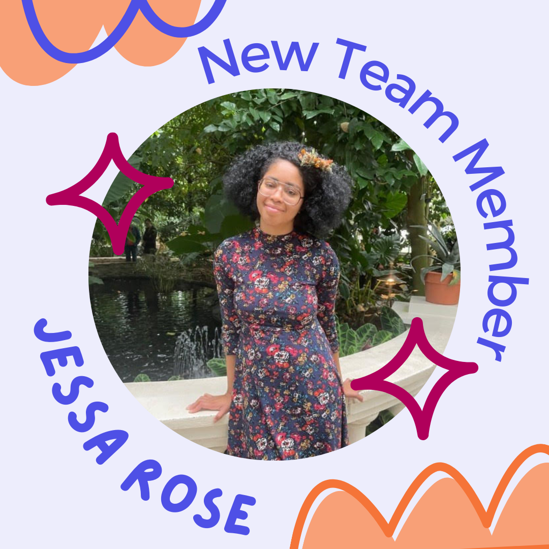 Text: New team member. Jessa Rose. Image description: A Black woman in a floral dress smiles at the camera. She stands in front of a lot of greenery.