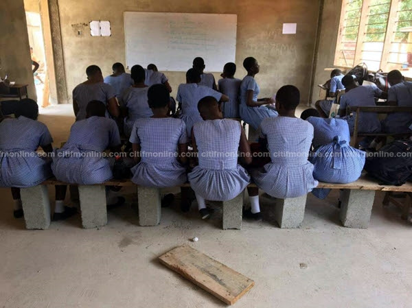 Citi News earlier reported that some students were sitting on cement blocks, with no tables