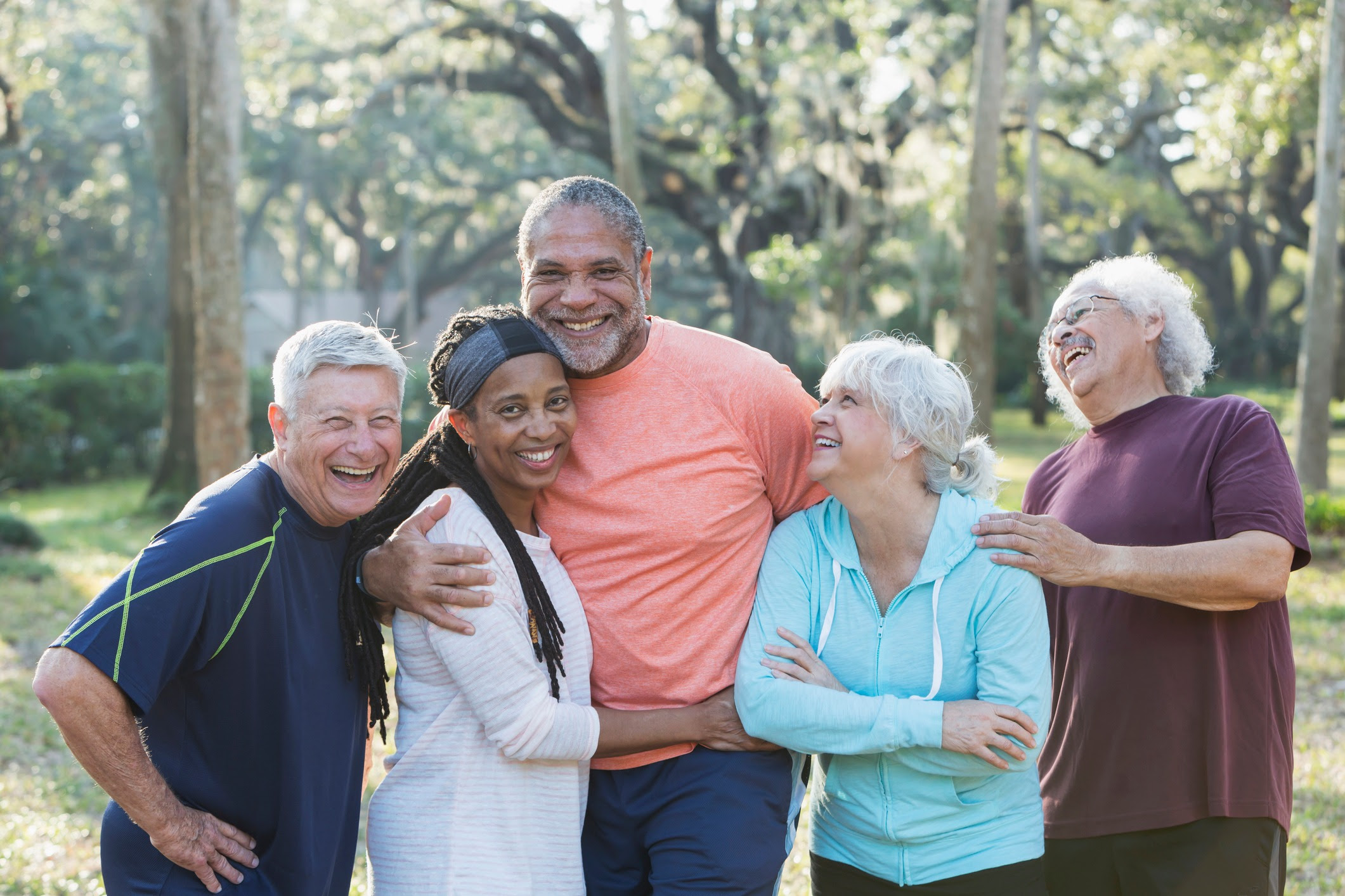 Group of senior adults outdoors exercising