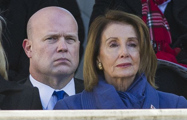 Acting United States Attorney General Matt Whitaker, left, and House Minority Leader Nancy Pelosi of Calif. attend the National Veterans Day Observance at Arlington National Cemetery in Arlington, Va., Sunday, Nov. 11, 2018. (AP Photo/Cliff Owen)