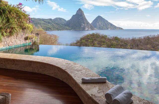 The World Heritage Petit Piton framed by  beautiful infinity-pool. View from the famous resort Jade Mountain.