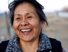 Photo of an older woman smiling.