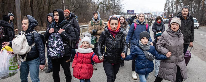 War of Russia against Ukraine. War refugees in Ukraine. KYIV, UKRAINE - Mar. 05, 2022: War of Russia against Ukraine. Women, old people and children evacuated stock images