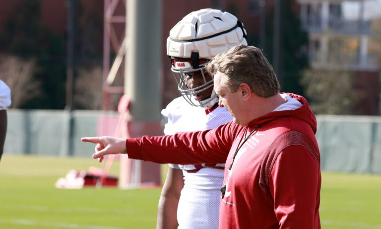 Alabama OL coach Eric Wolford giving signals in 2022 spring practice
