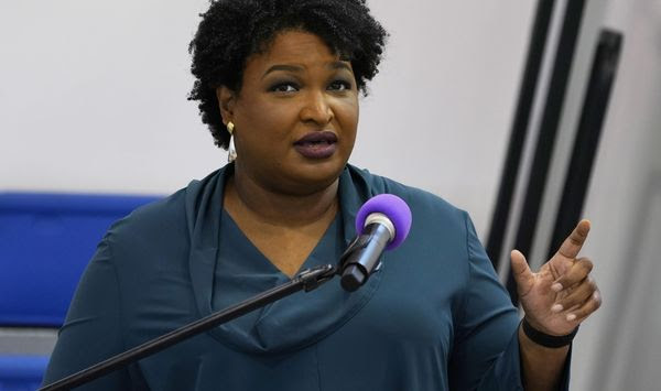 Stacey Abrams speaks during a church service in Norfolk, Va., Sunday, Oct. 17, 2021. A political organization led by the Democratic titan is branching out into paying off medical debts. Fair Fight Action on Wednesday, Oct. 27 told The Associated Press that it is donating $1.34 million from its political action committee to wipe out debt owed by 108,000 people in Georgia, Arizona, Louisiana, Mississippi and Alabama.   (AP Photo/Steve Helber, File)