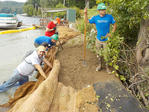 contractors and volunteers create fisheries habitat