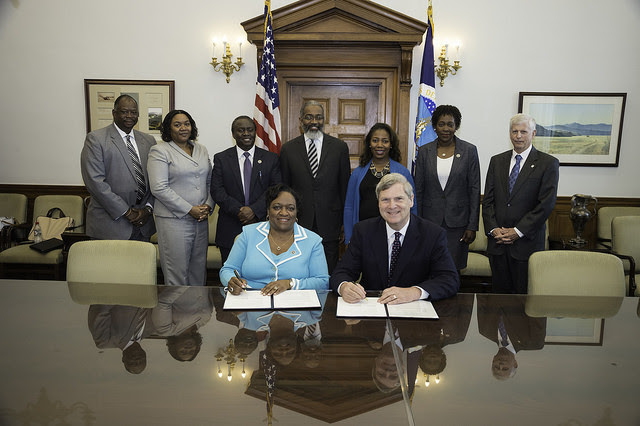 Secretary Vilsack signs an MOU reaffirming the partnership between the USDA and 1890s Universities. 