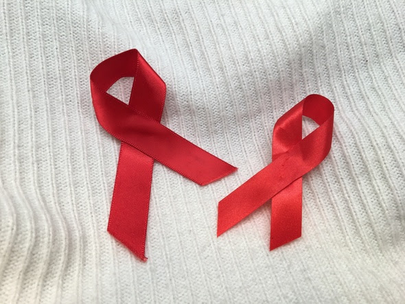 Two HIV awareness ribbons