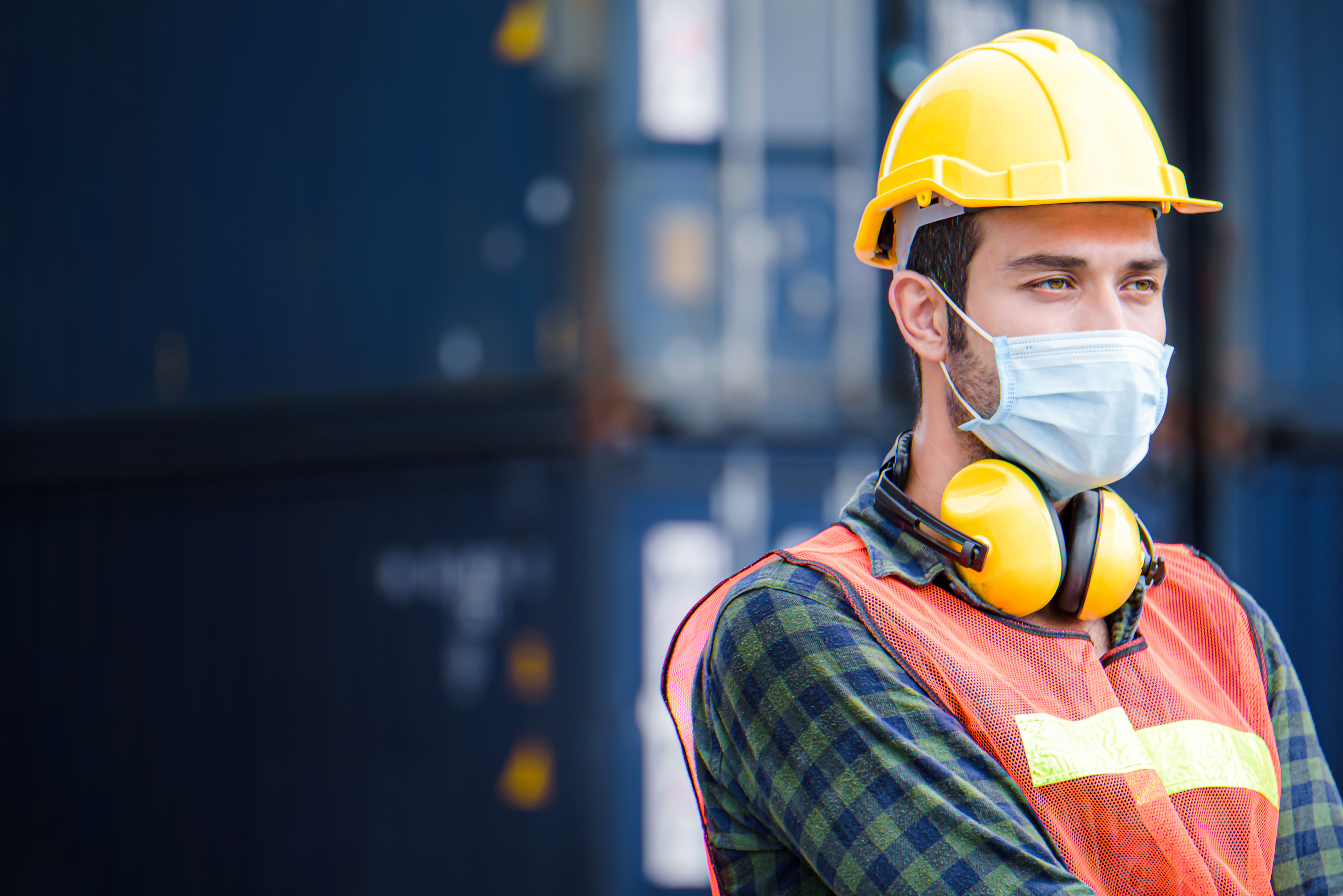A worker wearing appropriate personal protective equipment
