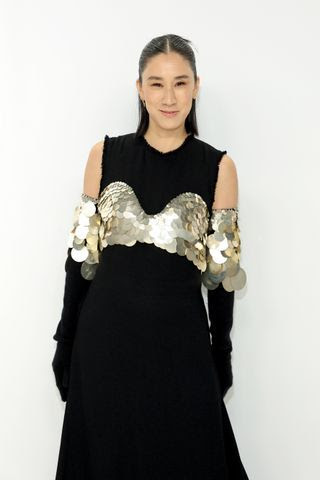 Image may contain Dress Clothing Evening Dress Formal Wear Adult Person Eva Chen Long Sleeve Sleeve and Portrait