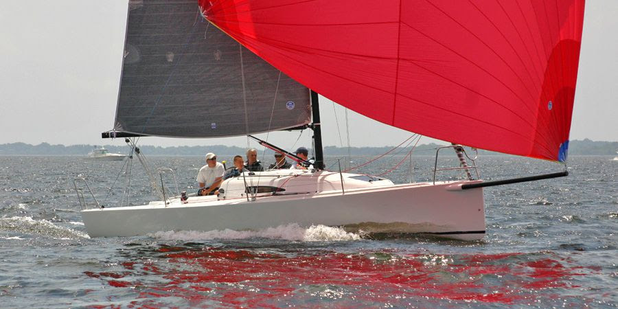 J/88 sailboat- sailing under spinnaker