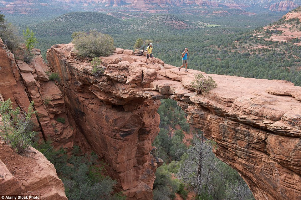 You                                                      won't want to                                                      stumble while                                                      walking across the                                                      Devil's Bridge in                                                      Red Rock-Secret                                                      Mountain                                                      Wilderness Area                                                      outside Sedona,                                                      Arizona, which has                                                      sheer drops either                                                      side of its arched                                                      structure