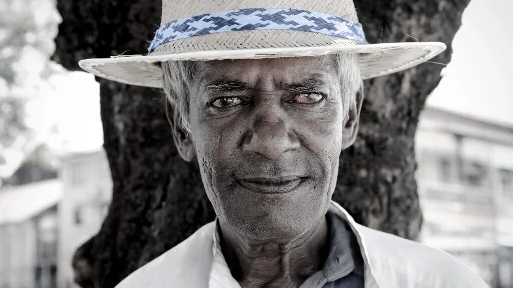 An older man with cataracts in one eye