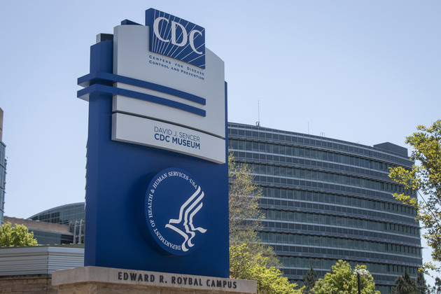 A Centers for Disease Control and Prevention sign stands at the entrance of their offices in Atlanta.