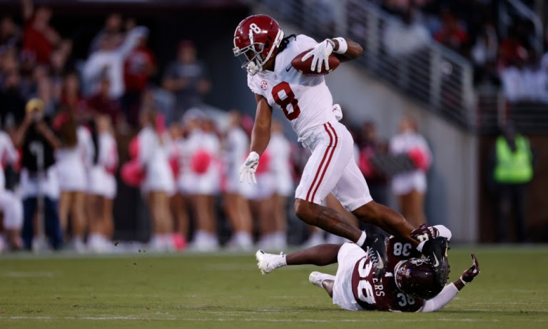 John Metchie (#8) breaks a tackle and scores TD for Alabama versus MSU