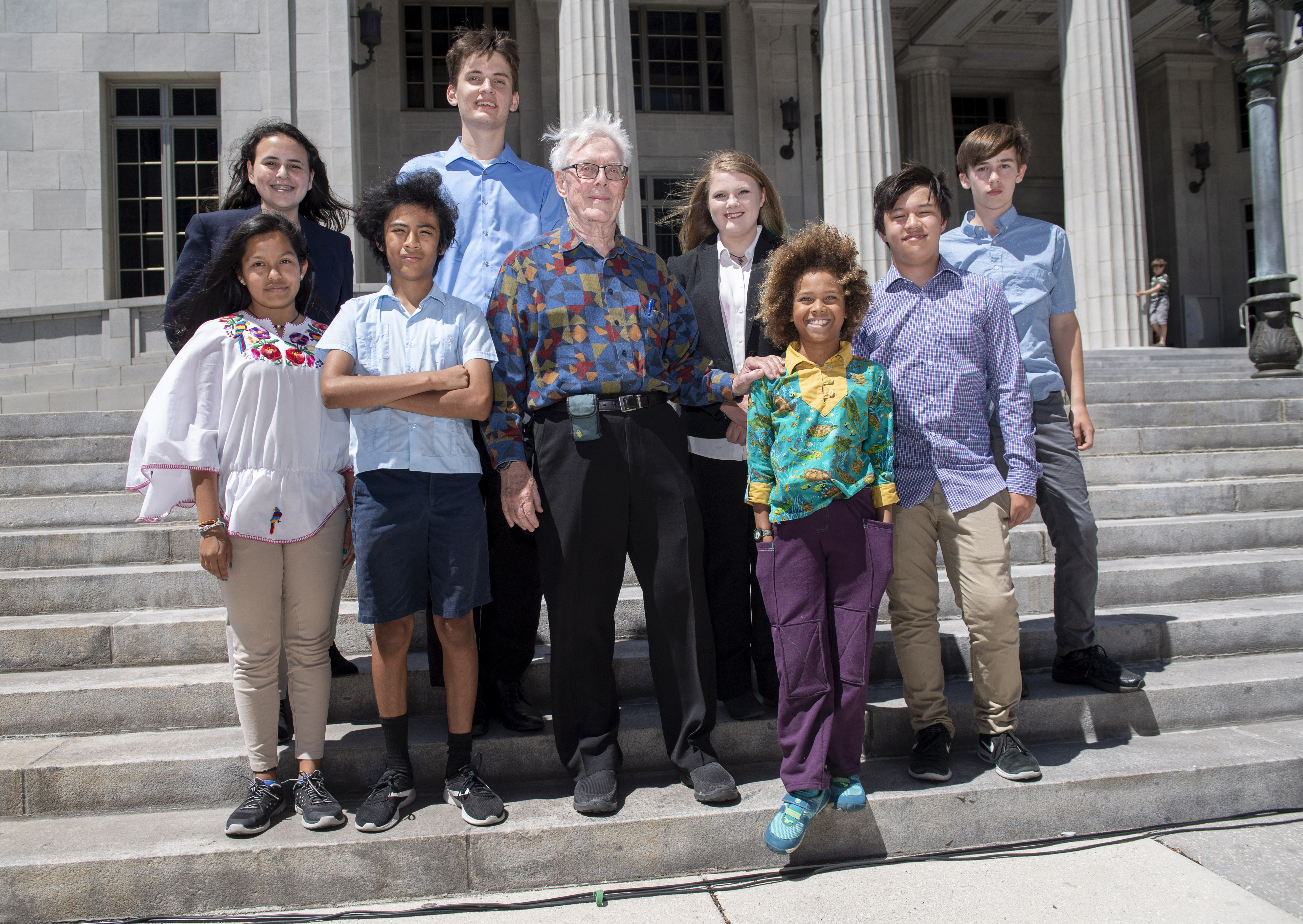 The kids with Dick Jacobs on courthouse steps in Miami in April 2018. Learn more at ourchildrenstrust.org/florida. [Courtesy of Robin Loznak, Our Children's Trust]
